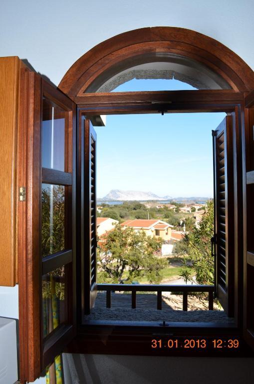 Iss Travel, Citai Panoramic Apartments - 1,5 Km From The Beach San Teodoro  Rum bild
